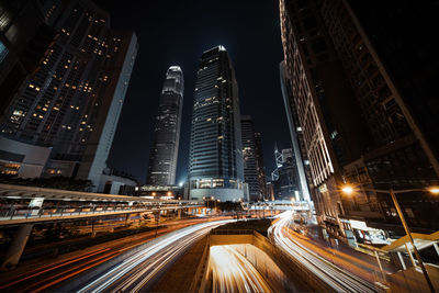 High angle view of illuminated buildings in city at night