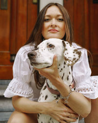 Portrait of woman with dogs