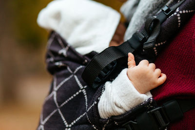 Close-up of man holding hands