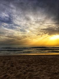 Scenic view of beach during sunset