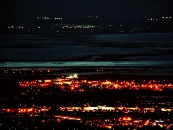 Illuminated cityscape at night