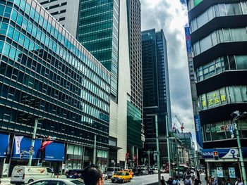 Panoramic view of city street and buildings