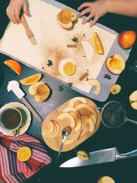 High angle view of person preparing food on table