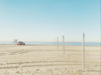 Scenic view of beach against clear sky