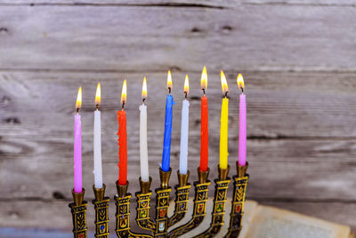 Close-up of colorful candles on table during hanukkah