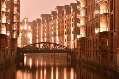 View of illuminated bridge in city