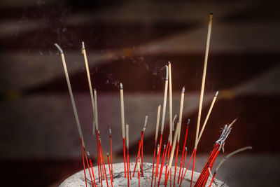 Incense sticks burning at temple