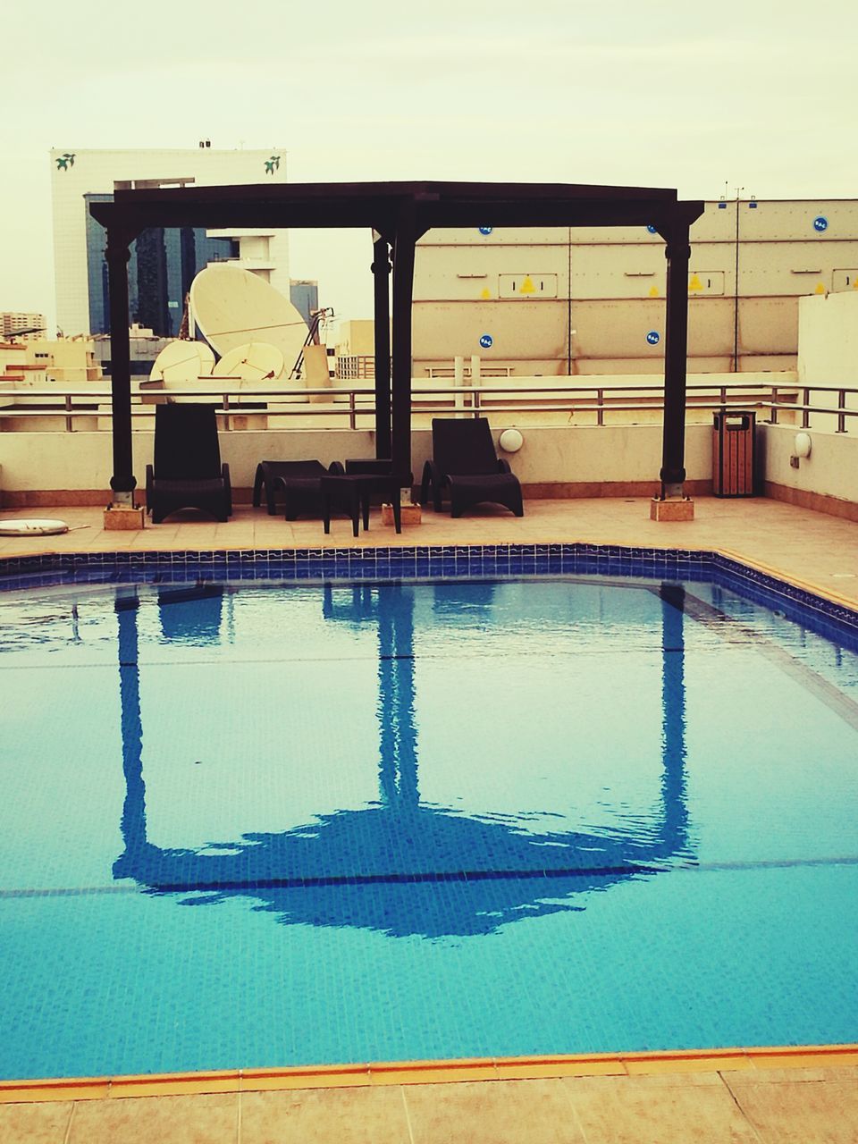 SWIMMING POOL AGAINST SKY