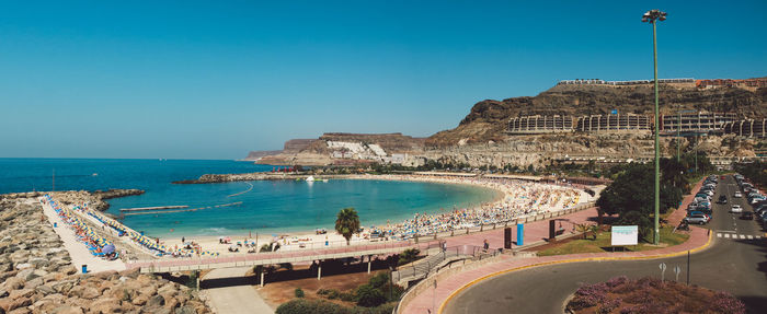Panoramic view of blue sea against clear sky