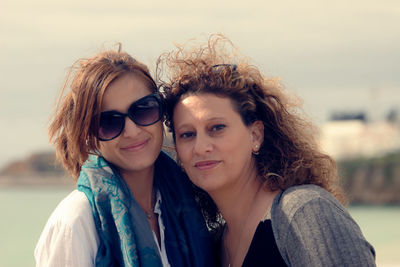 Portrait of smiling friends outdoors