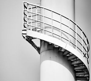 Low angle view of spiral staircase against sky