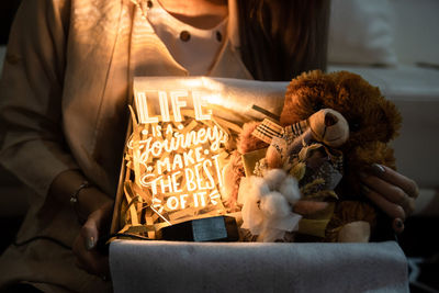 Close-up of woman with gift package