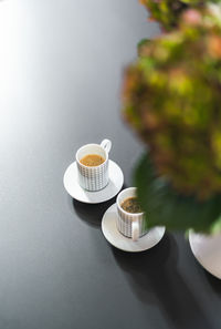 Close-up of coffee cup on table