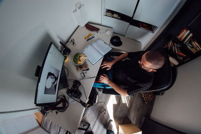 High angle view of man working at office