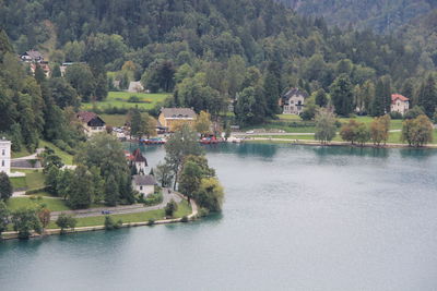 Scenic view of lake by buildings