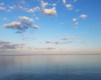 Scenic view of sea against blue sky