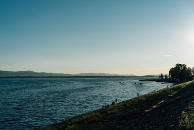 Scenic view of sea against clear sky