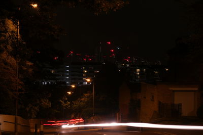 Light trails on city street at night