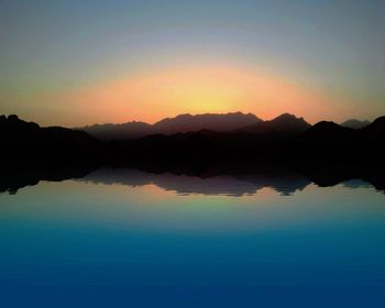 Sunset over calm lake