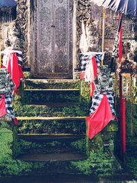 Multi colored flags hanging on clothesline