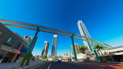 Low angle view of buildings against clear blue sky