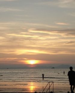 Scenic view of sea at sunset