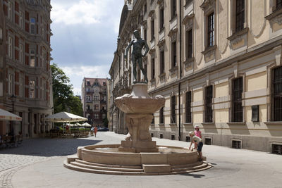 Wroclaw, poland - june 05 2019 - the swordsman's fountain located opposite the university of wroclaw