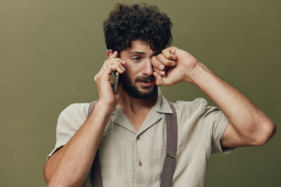 Young man using mobile phone