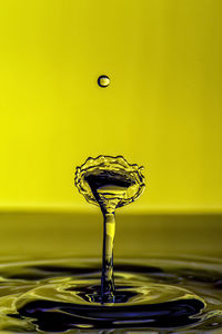 Close-up of drop splashing in water