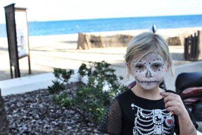 Close-up of girl with face paint