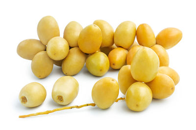 Close-up of fruits against white background