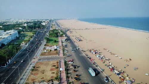 High angle view of road by sea against sky