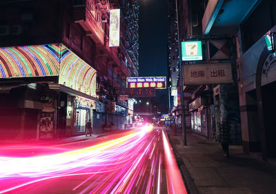 Light trails on city street at night