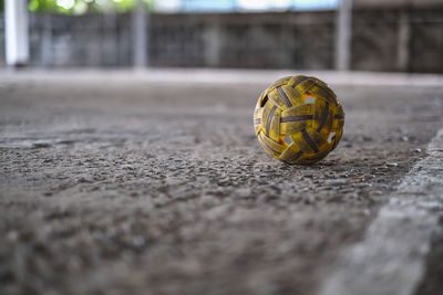 Close-up of shell on ball in city