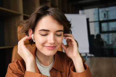 Young woman using mobile phone