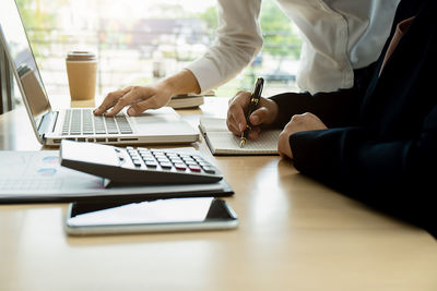 Man using laptop on table