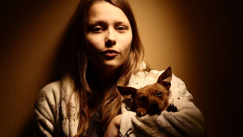 Portrait of woman with dog