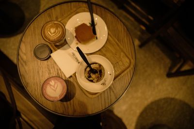 High angle view of tea light candles on table