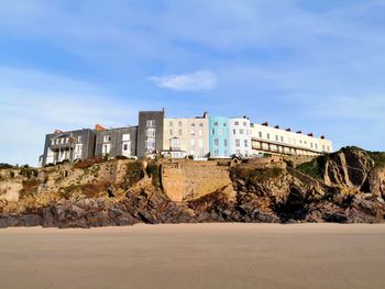 Buildings in city against sky