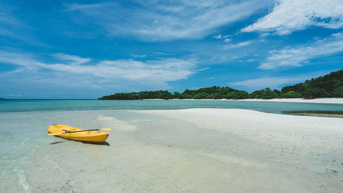 Scenic view of beach against sky