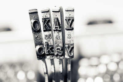 Close-up of text on old metal