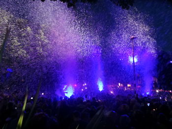 Rear view of people enjoying music concert