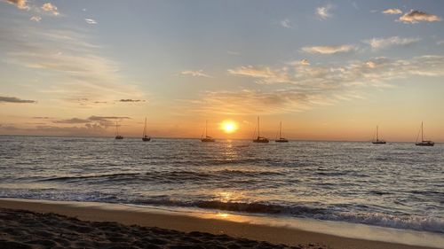 Scenic view of sea against sky during sunset