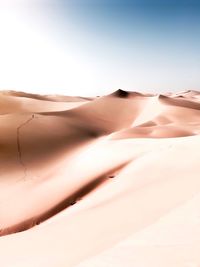 Scenic view of desert against clear sky