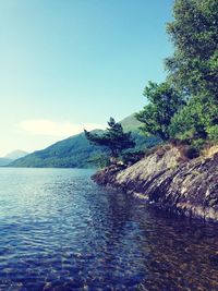 Scenic view of calm sea against clear sky