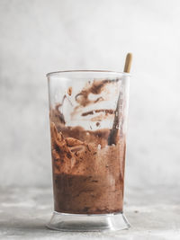 Close-up of ice cream in glass on table