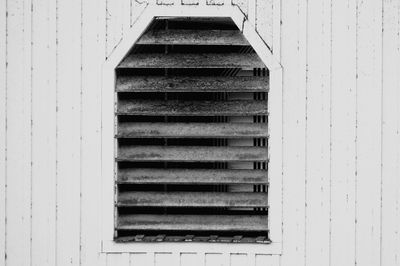 Glass shutters of covered bridge window