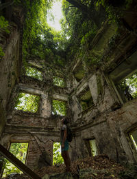 Low angle view of old abandoned building