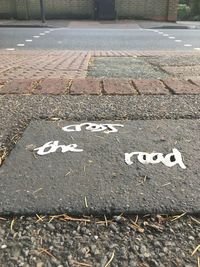 High angle view of text on road