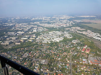 High angle view of city buildings against sky